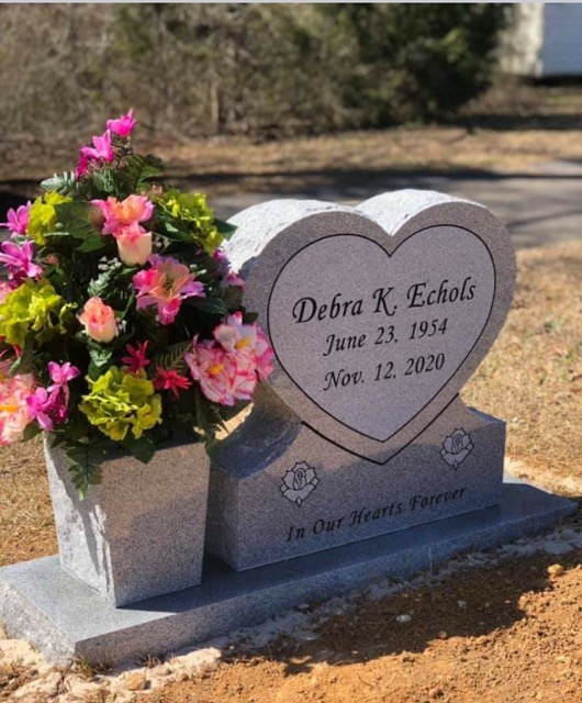 Standing heart headstone with photos and flower vase