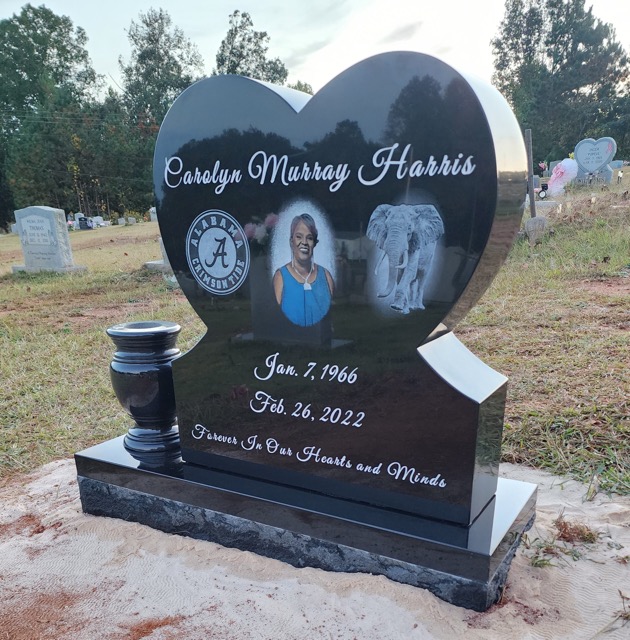 Black standing heart headstone with photos and flower vase