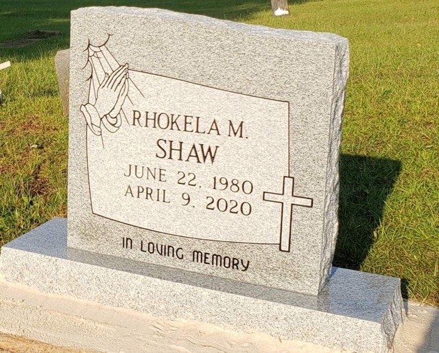 Standing Headstone with carvings and cross